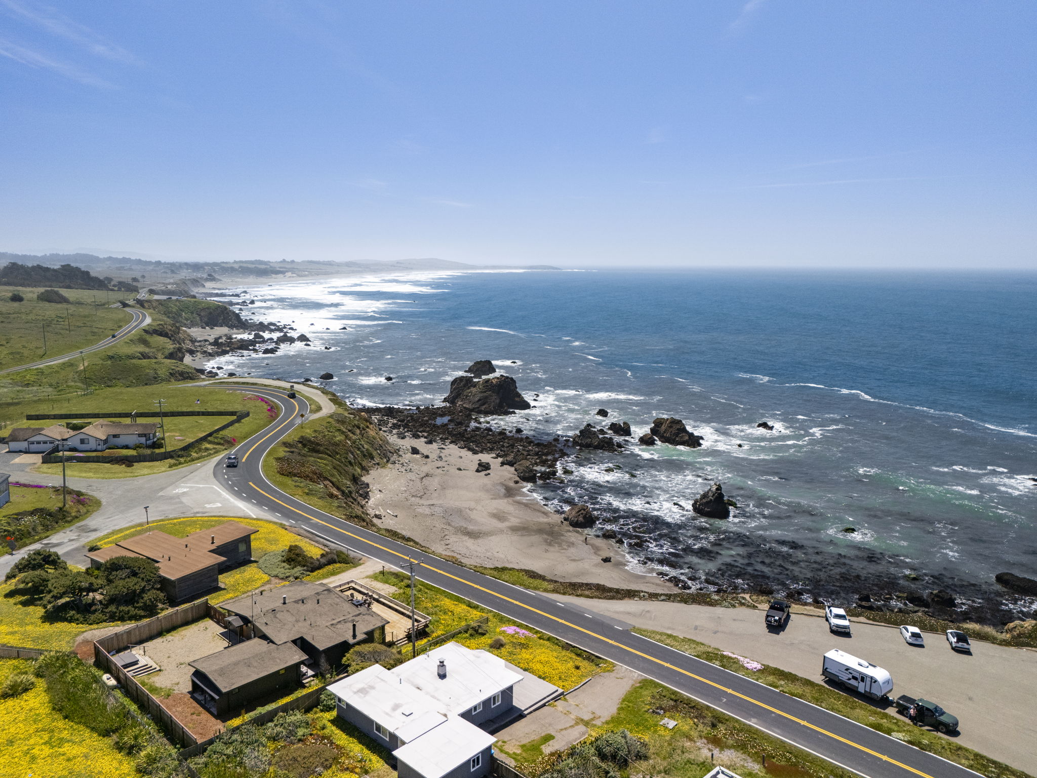 Aerial view of the property and coastline